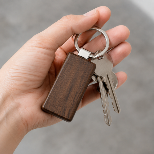 Close-up of wooden keychain, smooth texture