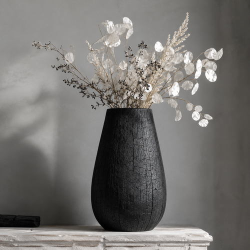 Close-up of the textured surface of the ceramic vase