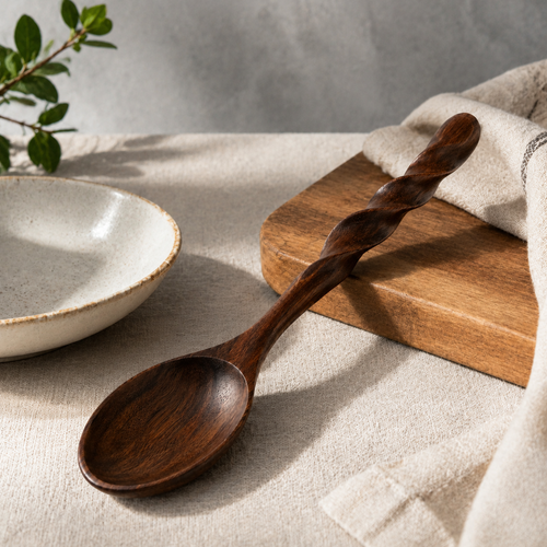 Side view of wooden spoon showing twisted design