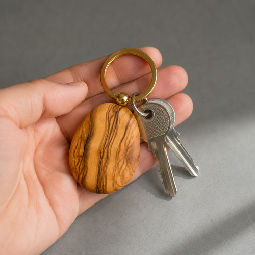 Natural olive wood grain on keychain