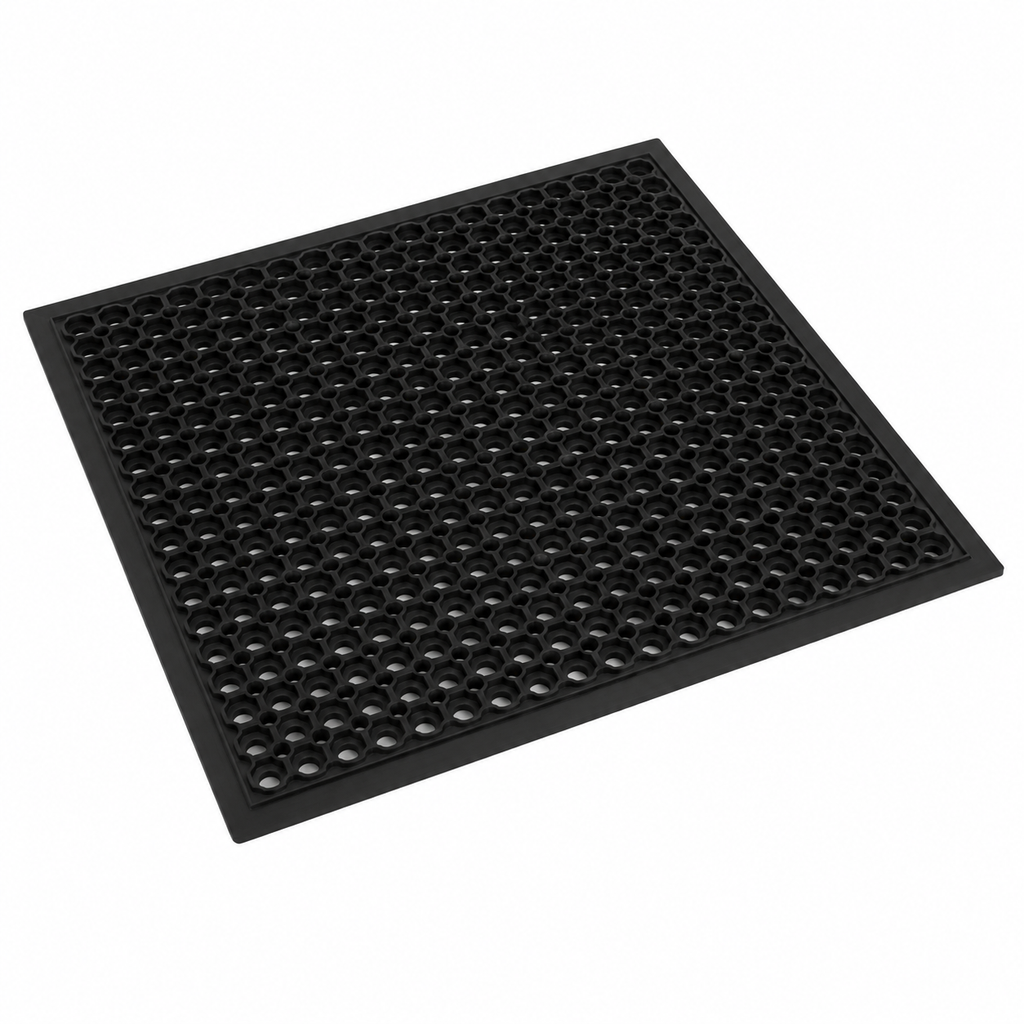 Top view of black rubber floor mat with drainage holes.