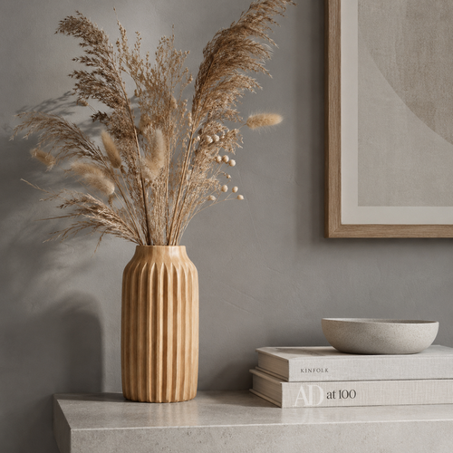 Elegant wooden vase with unique carved design.