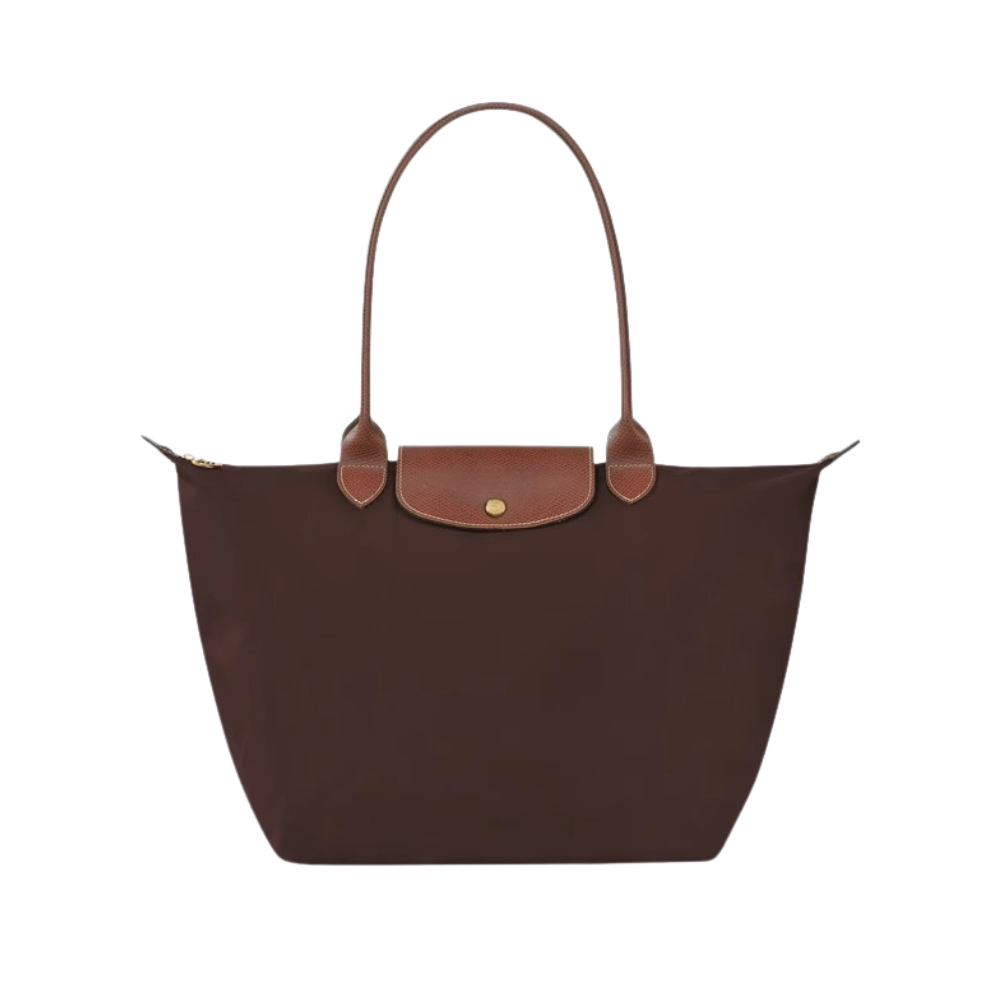 Longchanp Le Pliage bag worn as everyday tote.