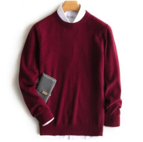 Lifestyle shot of man wearing premium cashmere sweater in elegant setting