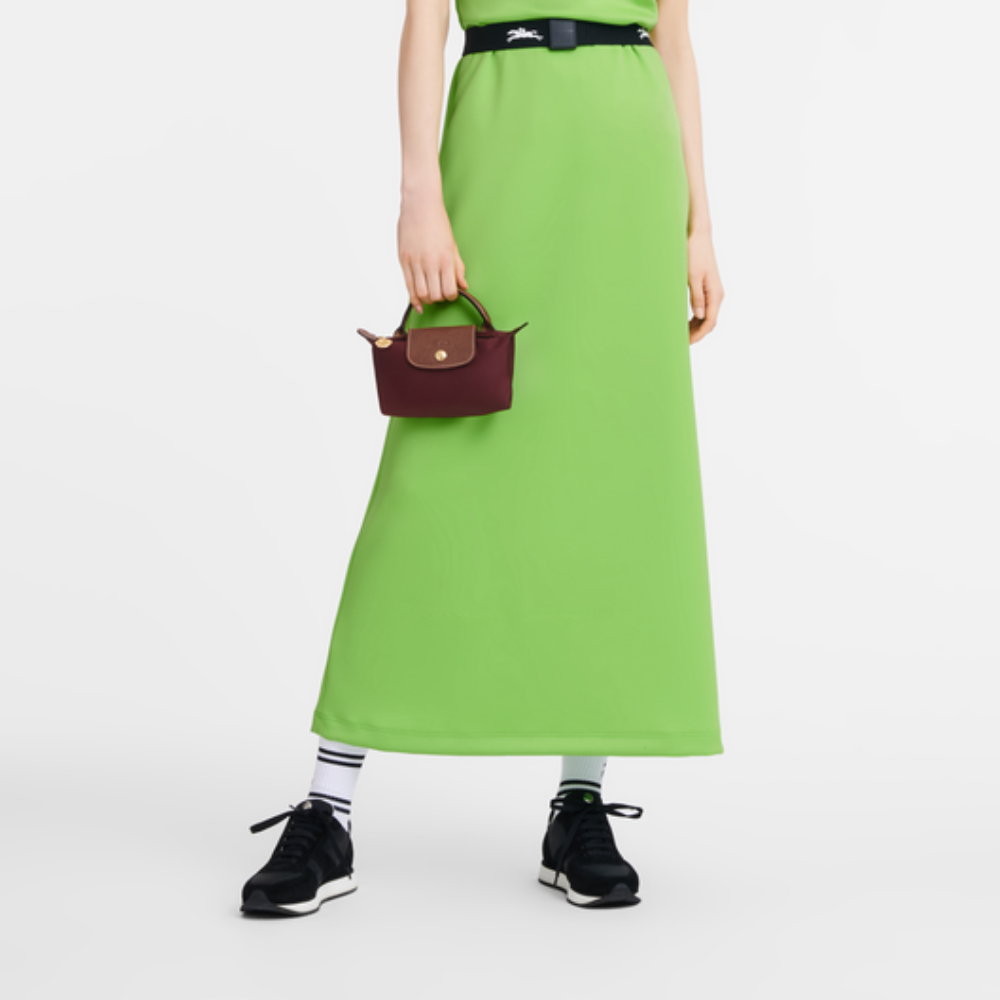 Longchamp Élan Mini Bag showing compact size and spacious interior organization.