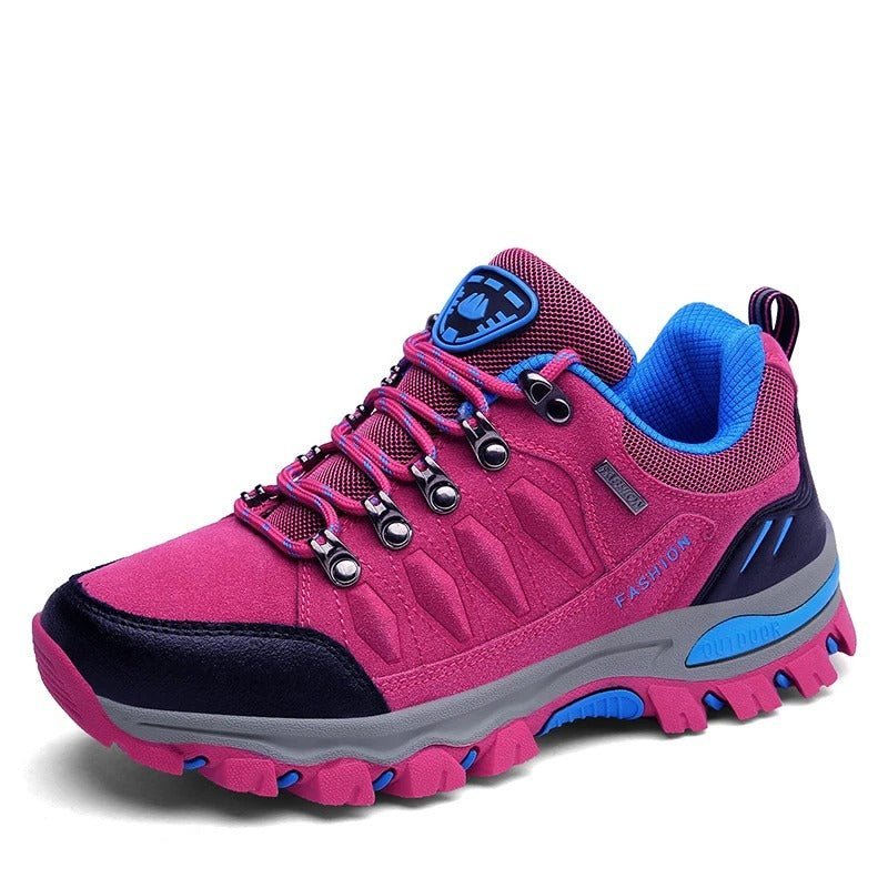 Women's hiking shoes in pink color showing breathable material construction