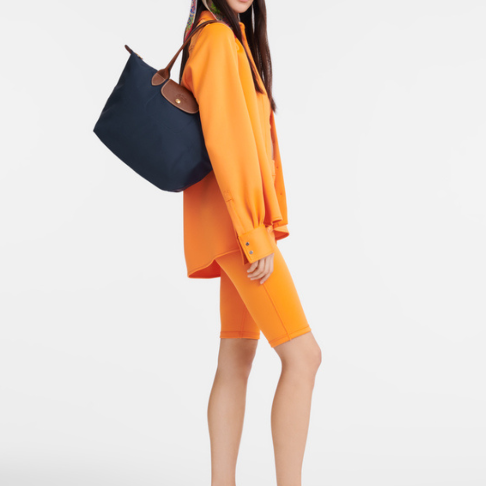 Longchanp Le Pliage bag in Black color.