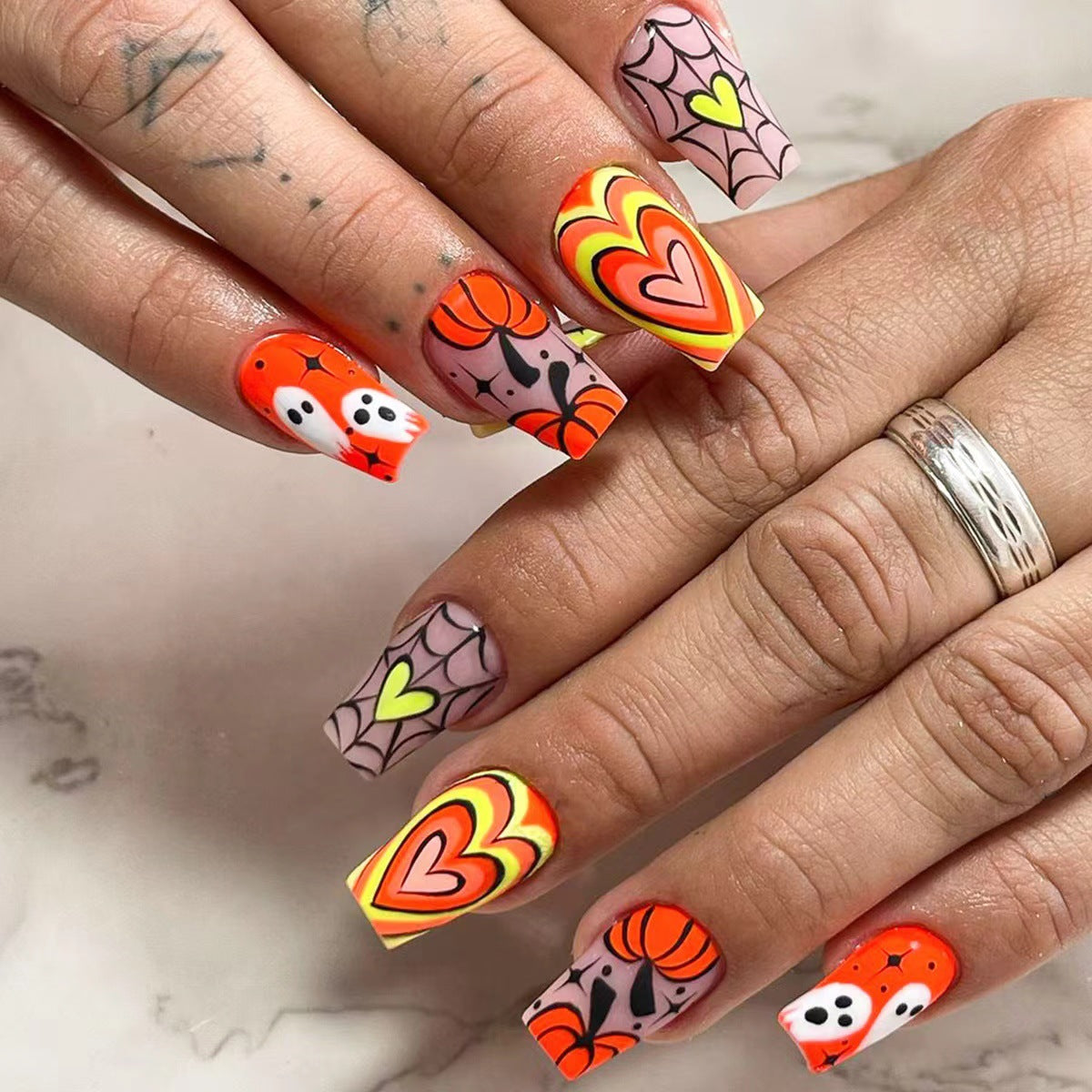 Acrylic Press-On Nails with Creative Fall Designs