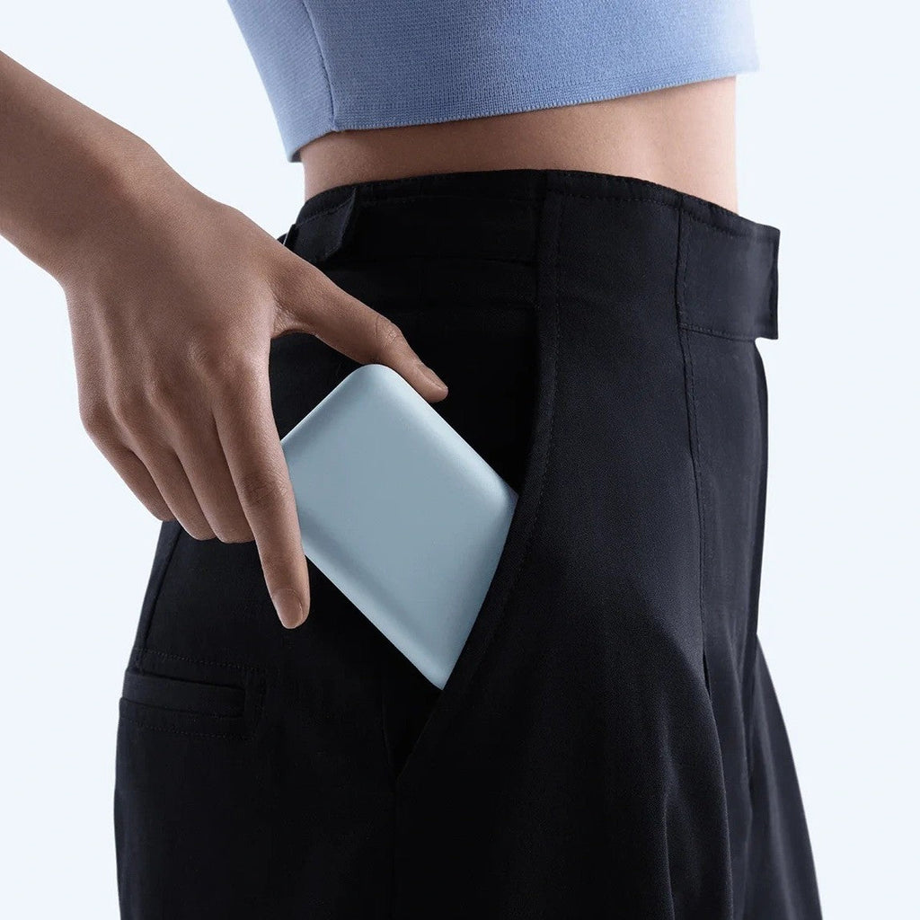 Compact High-Capacity Portable Power Bank with Built-In USB-C Cable and Silicone Carry Loop