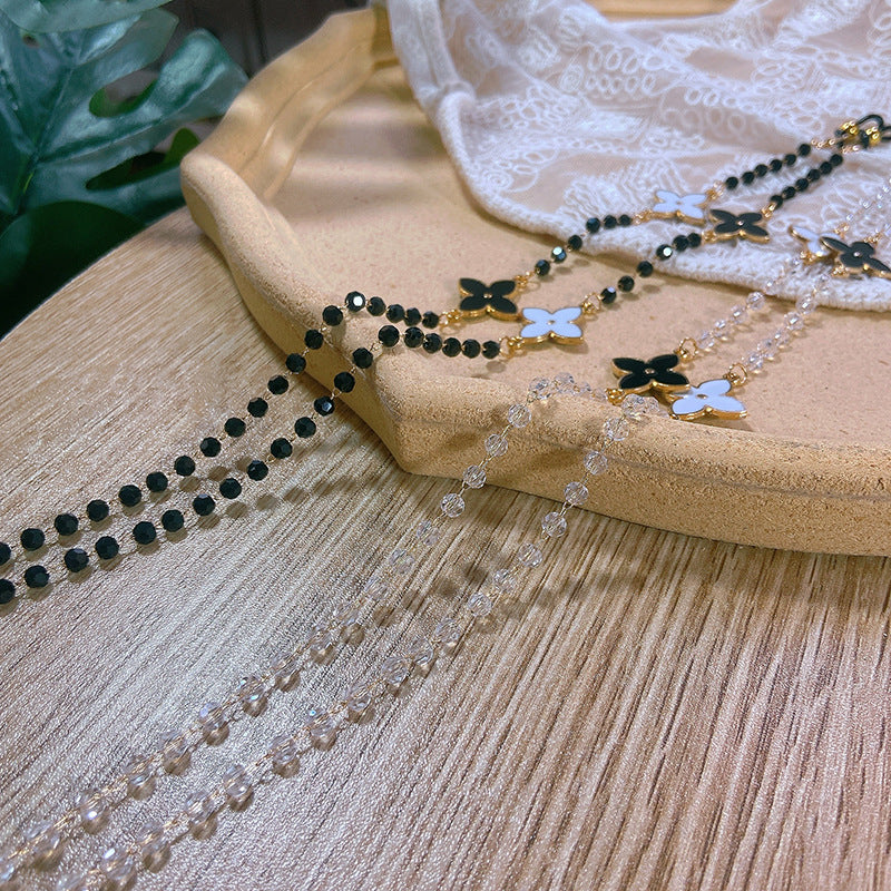Elegant pearl necklace with flower pendants