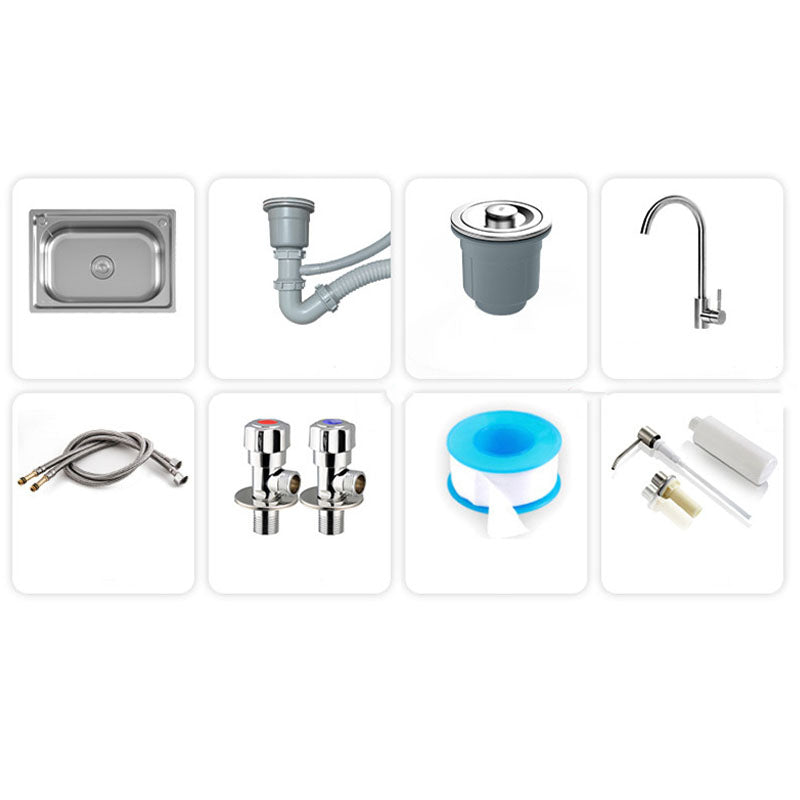 Modern workstation undermount kitchen sink in stainless steel with waste assembly and faucet