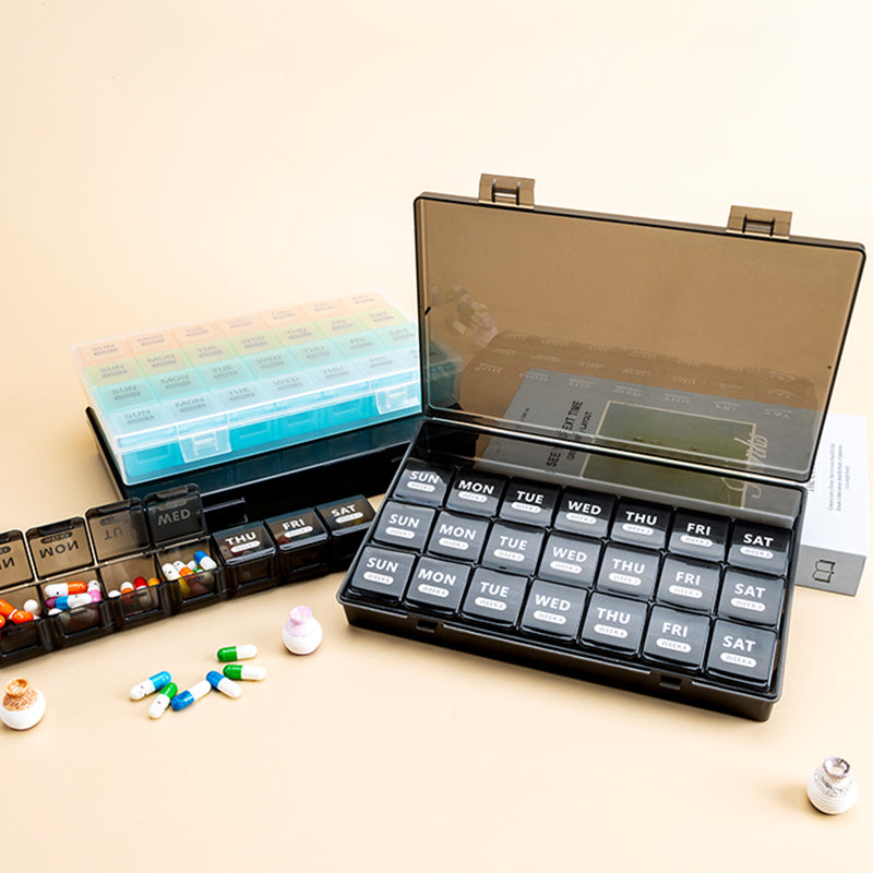 Pill organizer with 28 compartments
