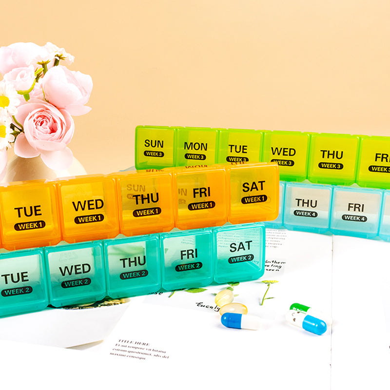 Pill organizer with 28 compartments