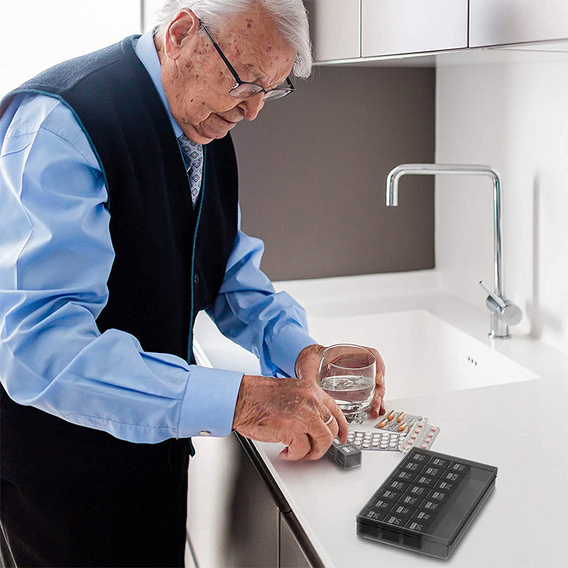 Pill organizer with 28 compartments