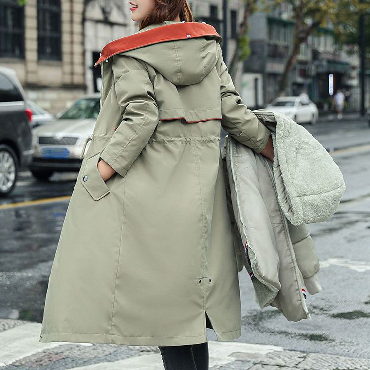 Women's hooded winter parka with faux fur collar