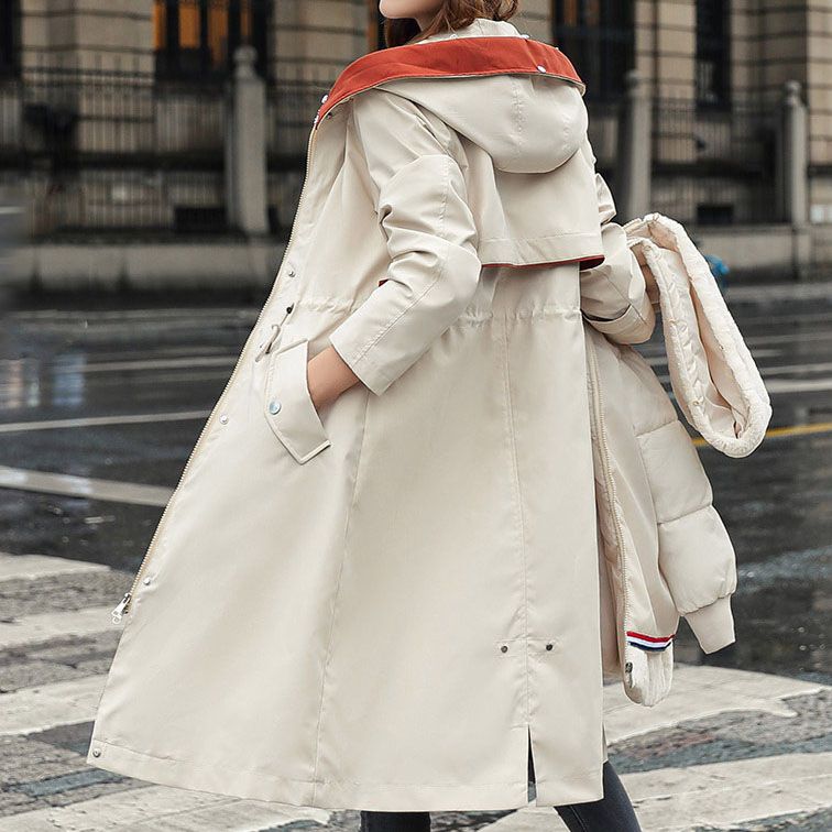 Women's hooded winter parka with faux fur collar