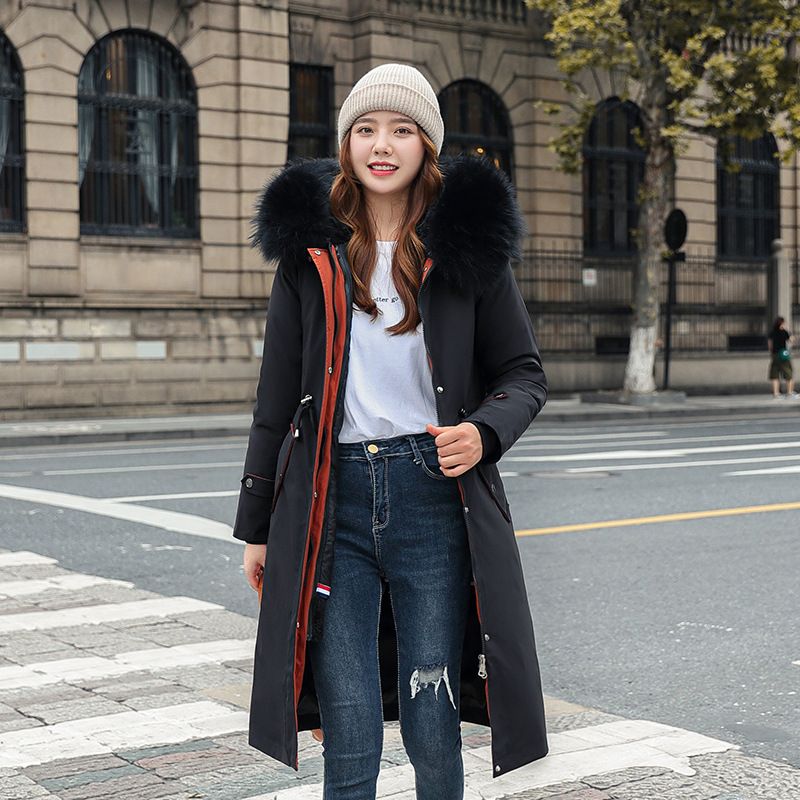 Women's hooded winter parka with faux fur collar