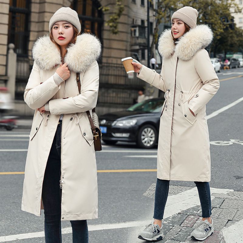 Women's hooded winter parka with faux fur collar