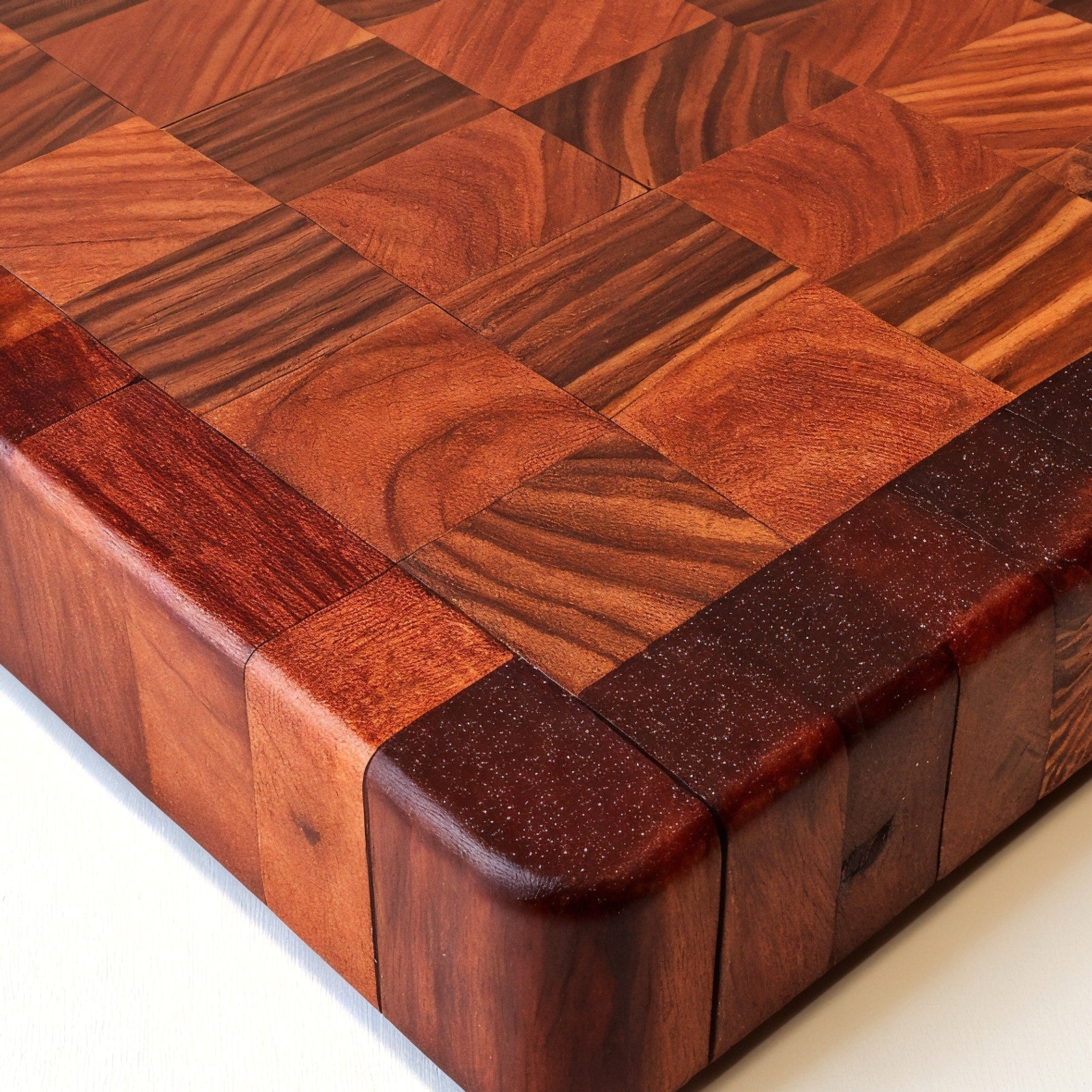 Shopaverly Padauk Elegant Butcher Block — close view of the front edge showing thickness and polished finish